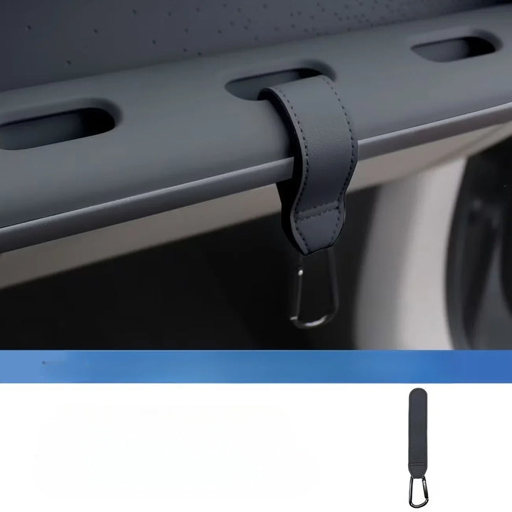 Leather car interior bag hanger hook installed on a vehicle&